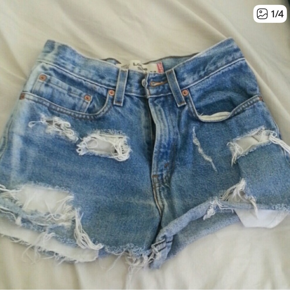 Levi's High Waist Light Blue Distressed Shorts